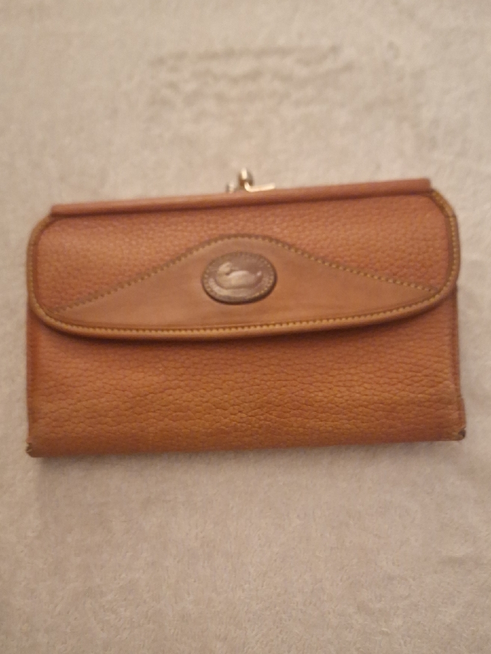 Dooney & Bourke Brown Pebble Leather Wallet with Logo Emblem